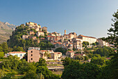 The old citadel of Corte perched on the hill surrounded by mountains, Haute-Corse, Corsica, France, Europe