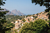 The old citadel of Evisa perched on the hill surrounded by mountains, Southern Corsica, France, Europe