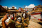 Kids with faces painted at the Holi Festival, Durbar Square, Kathmandu, Nepal, Asia