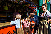 Family at the Shooting Gallery at Octoberfest, Munich, Bavaria, Germany