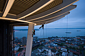 Two Skala rope access technicians pressure wash Seattle's iconic Space Needle using only heated high pressure pure water  on May 22, 2008. This is the Space Needle's first cleaning since it was built in 1962. German based company Karcher Gmbh is donating 
