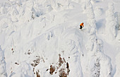 Male Skier Skiing On Snowy Landscape In Whitefish, Montana, Usa