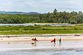 Surfers in Itacare Beach, South Bahia, Brazil