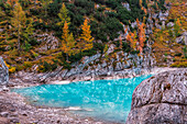 Italy, Veneto, Cortina d'Ampezzo, autumn reflections at Sorapiss Lake
