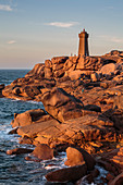Ploumanach lighthouse at sunset,  Perros-Guirec, Côtes-d'Armor, Brittany, France