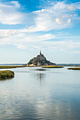 Clouds in the sky and water in the foreground,  Mont-Saint-Michel, Normandy, France
