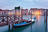 Europe, Italy, Veneto, Venice,  The iconic venetian gondola on the Grand Canal at dawn