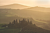 Sunrise in Val d'Orcia, Siena province, Tuscany district, Italy