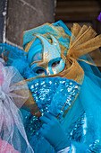 Colorful mask and costume of Carnival of Venice famous festival worldwide Veneto Italy Europe