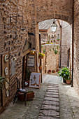 Spello, Perugia province, Umbria, Italy, A lane in the historical center of Spello medieval village