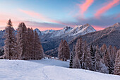 Europe, Italy, Veneto, Belluno, Dolomites, Colorful sunrise over the village of Coi, Zoldo valley