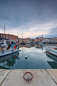 Europe, Slovenia, Primorska, Izola, Old town and the harbour with fishing boats in the morning