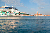 Europe, Italy, Veneto, Venice, Cruise ship Norwegian Jade passing in front of the island of St, George major