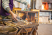 The ancient art of glass making in the workshops of the island of Murano Veneto Italy Europe