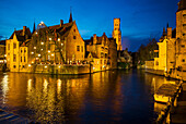 Belgium, Bruges, town skyline from the canal, dusk