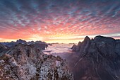 The heart shaped arch of stone in the Pale of the Balconies, Pala group, Dolomites Europe, Italy, Veneto, Agordino, Belluno