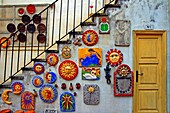 Pieces of decorative ceramics on the staircase