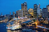 Sydney city skyline and berthed cruise ship