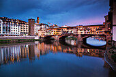 Ponte Vecchio at night reflected in the River Arno, Florence, UNESCO World Heritage Site, Tuscany, Italy, Europe