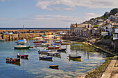 View of the harbour at mid-tide, Mousehole, Penwith, Cornwall, England, United Kingdom, Europe