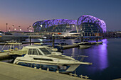 The Yas Viceroy Hotel and Yas Marina at dusk, Yas Island, Abu Dhabi, United Arab Emirates, Middle East