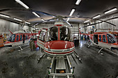 Helicopter sits in hangar before flight
