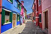 Alley with multi-coloured houses, Burano, near Venice, UNESCO World Heritage Site Venice, Venezia, Italy