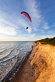 Paraglider at Hohes Ufer near Ahrenshoop, Baltic Sea, Mecklenburg-West Pomerania, Germany