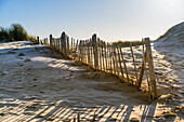 A wooden picket fence along a beach, South Shields, Tyne and Wear, England