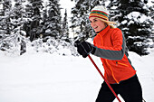 A young woman cross country skiing, Ohlson Mountain, Alaska, United States of America