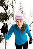A young woman cross country skiing, Ohlson Mountain, Alaska, United States of AmericaNone