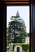 View out of the window of the gallery in the Vatican City at the St. Peter's Basilica, Rome, Latium, Italy