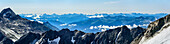 Three persons hiking descending from Soiernspitze, Reissende Lahnspitze and Wetterstein range with Zugspitze in background, Soiernspitze, Karwendel range, Upper Bavaria, Bavaria, Germany