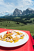 Alpe di Siusi/Seiser Alm, Dolomites, South Tyrol, Italy, The Kaiserschmarrn, a typical south tyrolean food