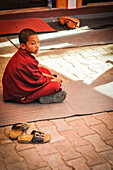 Young buddhist monk at Swayambhunath templen,Kathmandu, Nepal,Asia