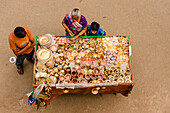 Varanasi, Uttar Pradesh, India, A small stand selling plates and pots