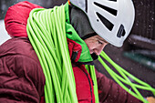 Ice climbing guide coiling rope