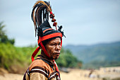 Man wearing hat and traditional costume, Pasola festival, Sumba Island, Indonesia