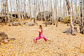 Young Woman Doing Yoga During Fall In Southwest Region