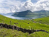 Village Oyndarfjordur. The island Eysturoy one of the two large islands of the Faroe Islands in the North Atlantic. Europe, Northern Europe, Denmark, Faroe Islands.