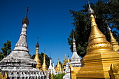 Golden pagodas at Shwe Paw island on Ayeyarwady (Irrawaddy) river, Shwegu, Kachin, Myanmar
