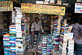 Bookstall holder in College Street, the world's largest second-hand book market for intellectuals, scholars and students, Kolkata ,Calcutta, West Bengal, India, Asia