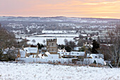 Cotswold village and landscape in snow at sunrise, Bourton-on-the-Hill, Cotswolds, Gloucestershire, England, United Kingdom, Europe