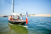 Arcachon Bay (in French, the Bassin d'Arcachon, and known locally simply as le Bassin) is a bay of the Atlantic Ocean on the southwest coast of France, situated in Pays de Buch between the Côte d'Argent and the Côte des Landes, in the region of Aquitaine.