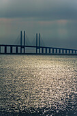Thunderstorm over the Öresund bridge and sun shining on the sea, Oresund Bridge, Malmo, Southern Sweden, SwedenSüdschweden, Schweden