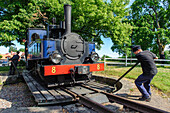 Historic steam train on manual turnstile in Mariefred, Sweden