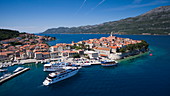 Aerial of cruise ship MS Romantic Star (Reisebüro Mittelthurgau) apporaching pier with Old Town behind, Kor?ula, Dubrovnik-Neretva, Croatia