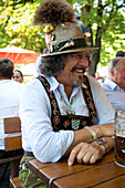 A member of the regular's table at the beer garden at the Viktualien Market in Munich, Bavaria