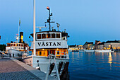 Old steamboats at Strömbron, Stockholm, Sweden