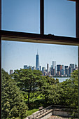 view of manhattan and one world trade center from a window in the main building on ellis island, museum of immigration immigration, new york harbor, new york city, state of new york, united states, usa